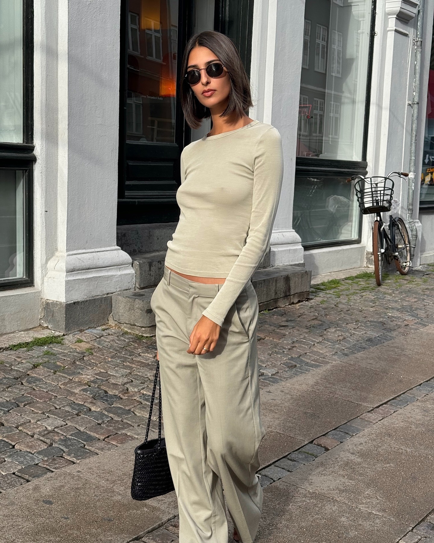 A woman in Copenhagen with straight hair and a blunt midi bob hairstyle