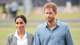 dubbo, australia october 17 meghan, duchess of sussex and prince harry, duke of sussex attend a naming and unveiling ceremony for the new royal flying doctor service aircraft at dubbo airport on october 17, 2018 in dubbo, australia the duke and duchess of sussex are on their official 16 day autumn tour visiting cities in australia, fiji, tonga and new zealand photo by dominic lipinski poolgetty images