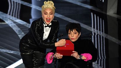 US actress-singer Lady Gaga (L) and US actress Liza Minnelli announce the Best Picture award onstage during the 94th Oscars at the Dolby Theatre in Hollywood, California on March 27, 2022. 