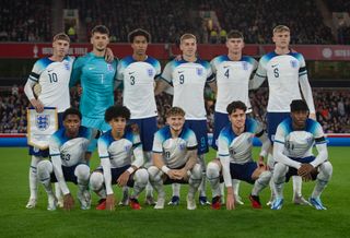  (Back row from left to right) Cole Palmer, James Trafford, Bashir Humphreys, Liam Delap, Charlie Cresswell, Jarrad Branthwaite, (front row from left to right) Jaden Philogene, Rico Lewis, Harvey Elliott, Hayden Hackney and Noni Madueke of England line up for team photos ahead of the UEFA U21 EURO Qualifier between England and Serbia at City Ground on October 12, 2023 in Nottingham, England. (Photo by Joe Prior/Visionhaus via Getty Images)