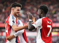 Arsenal players Declan Rice and Bukayo Saka celebrate