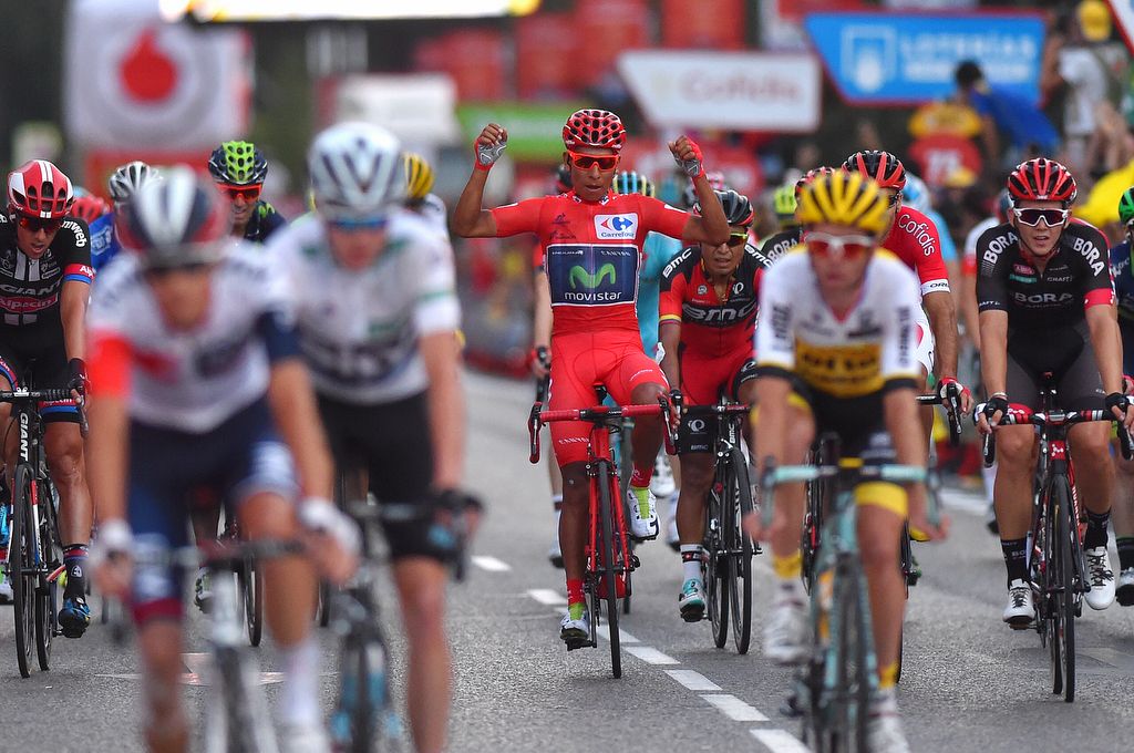 Nairo Quintana crosses the line and celebrates his overall victory