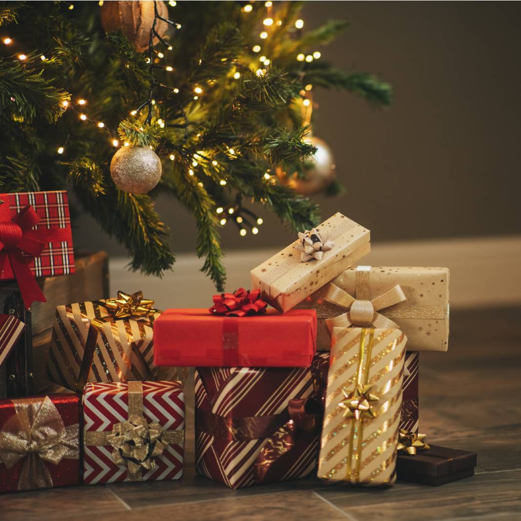 Wrapped gifts under a Christmas tree