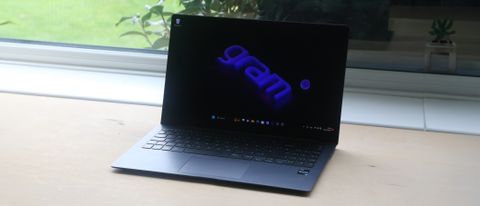 An LG gram SuperSlim 15.6" laptop sitting on a light desk