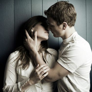 married couple kissing