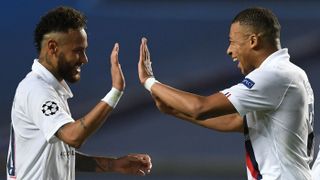 Neymar and Kylian Mbappe celebrate a goal for PSG