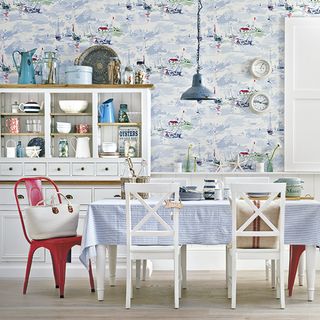 dinning table with chair white cabinet wallpaper on wall and wooden flooring