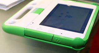 Shot of the OLPC closed. Notice the handle at the top.