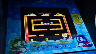 Close up of QQuarter Arcade Taito Bubble Bobble arcade machine gameplay