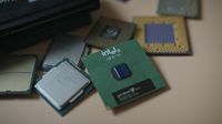 An Intel CPU sitting among other CPUs.