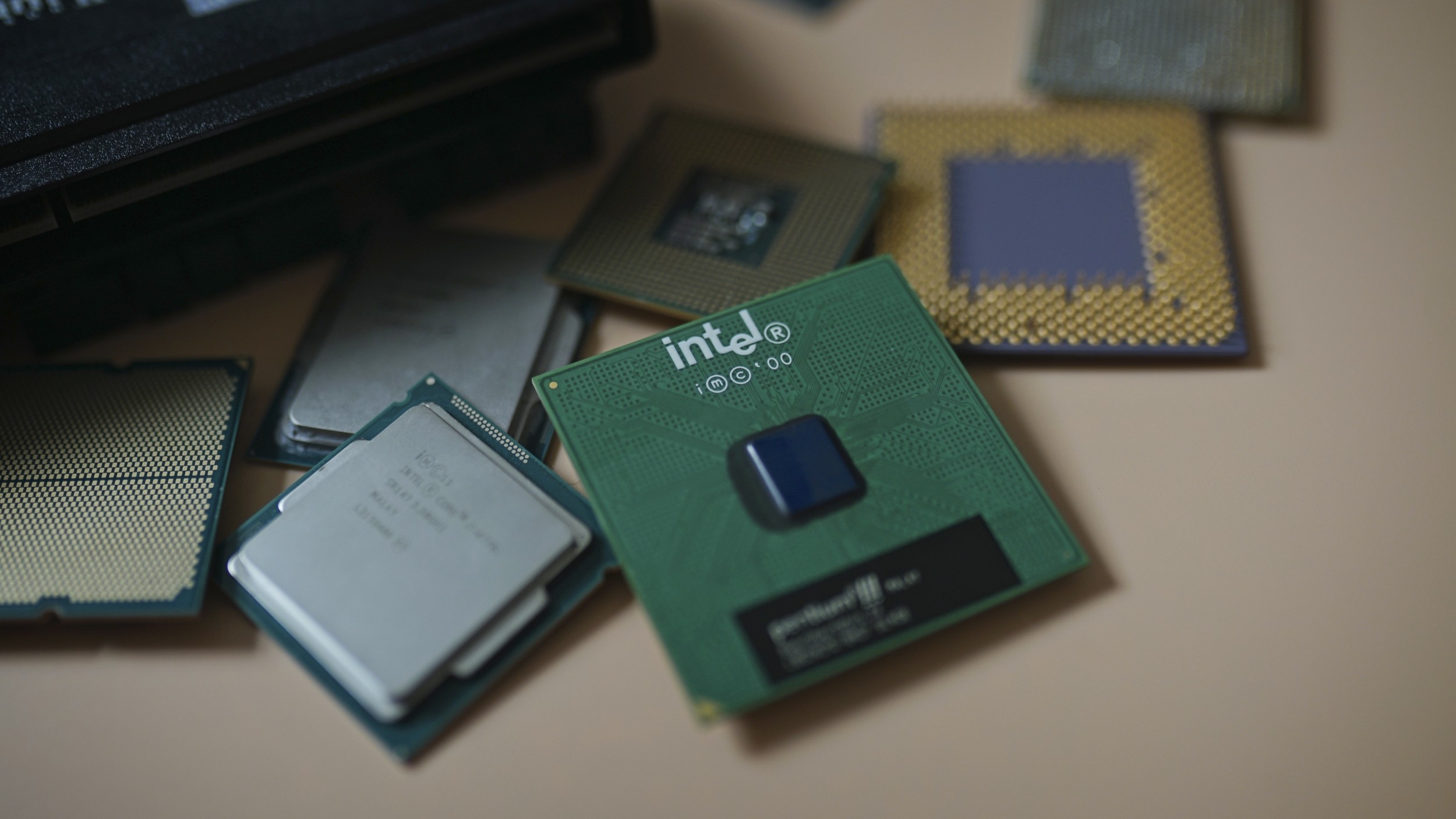 An Intel CPU sitting among other CPUs. 