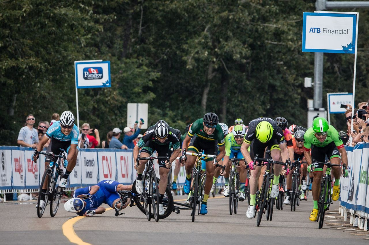 Travis McCabe hits the deck in a crash during stage 2 at the Tour of Alberta