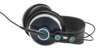 A pair of AKG K271 MKII studio headphones lying down