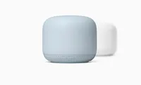 The Google Nest Wifi in blue and white against an off-white background