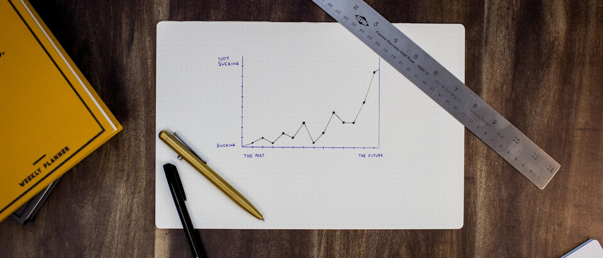 Data drawn on a chart with a ruler and pencil on either side