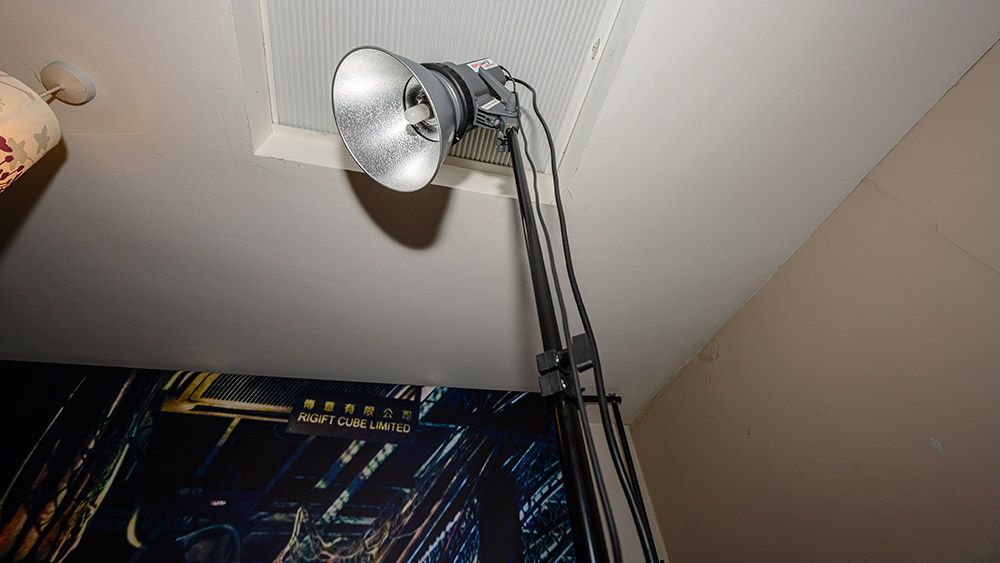 Use a printed backdrop to do a location shoot from your own home