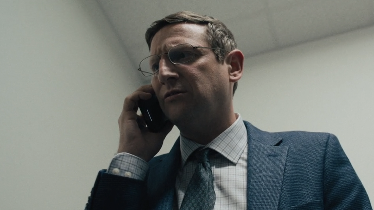 Ron talking angrily on phone in The Chair Company