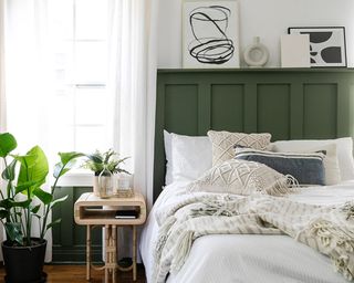 DIY board and batten wall painted with green wall paint decor in bedroom