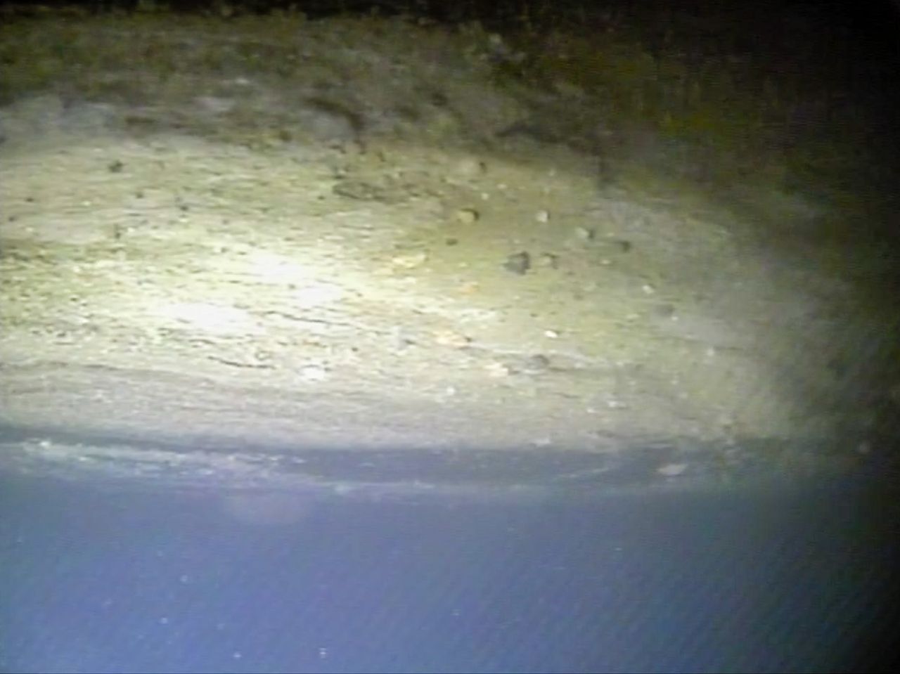 Icefin captured this image of sediments, rock and ice at the Thwaites Glacier grounding zone.