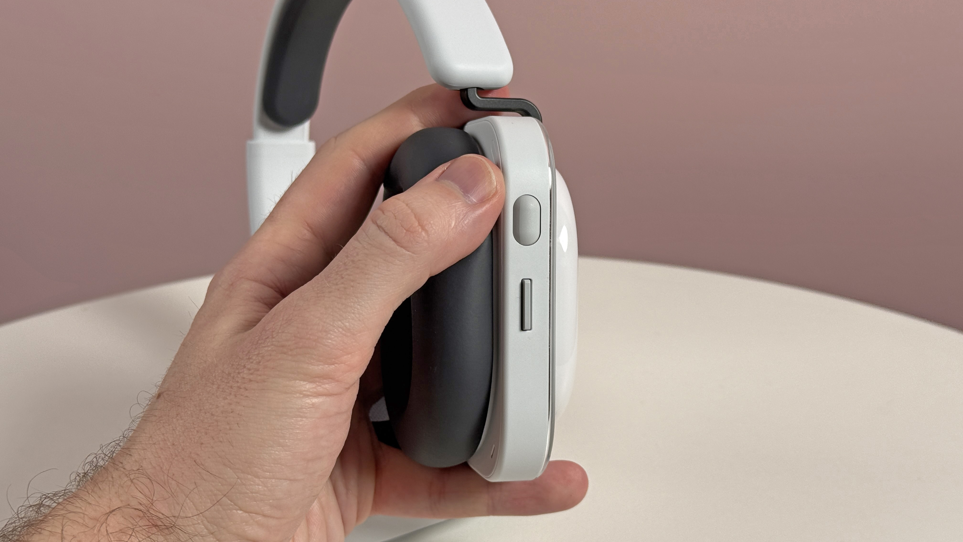 The Nothing Headphone (a) roller and rocker controls on the side