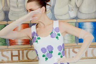 Model Hannelore Knuts poses against mural backdrop