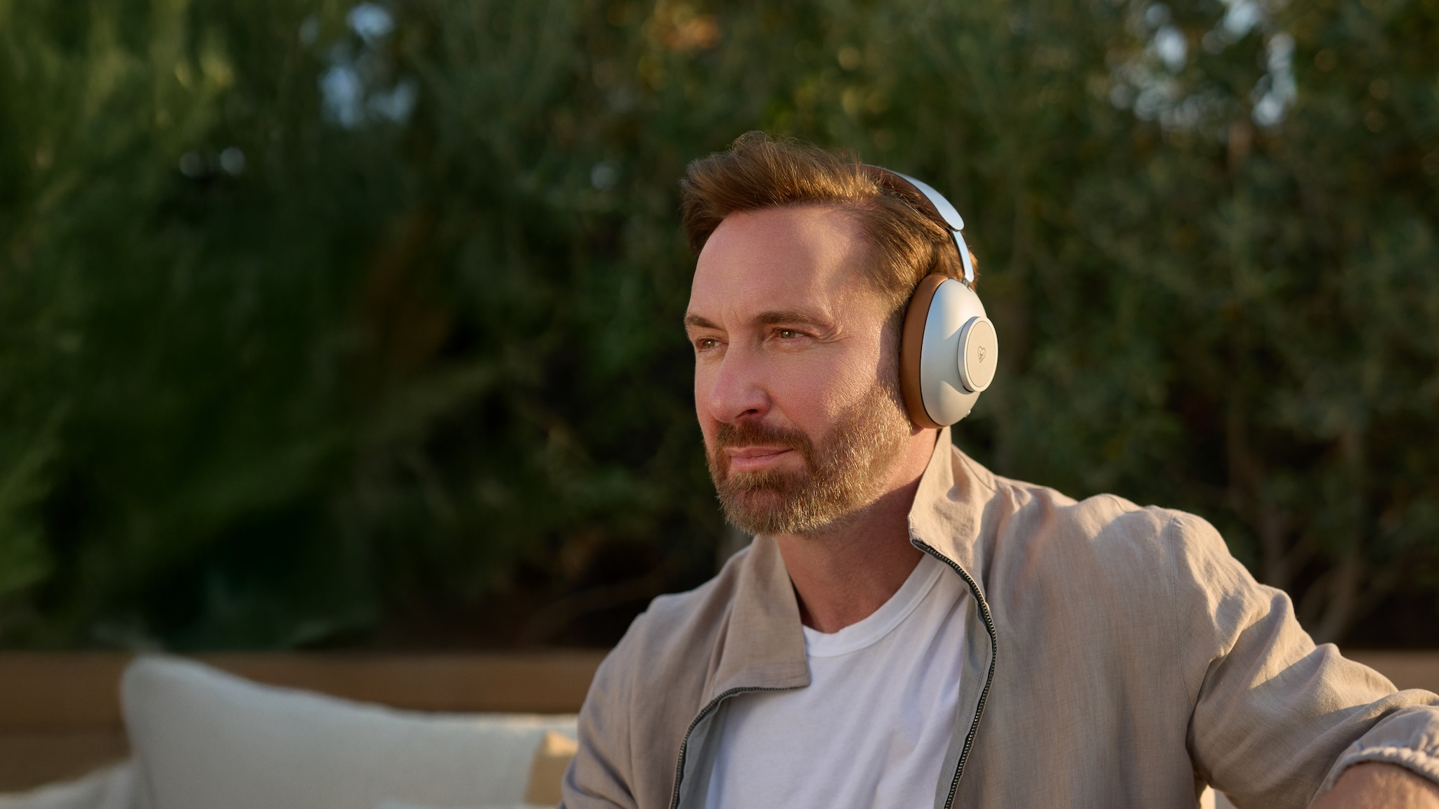 David Guetta wearing a pair of Loewe Leo headphones