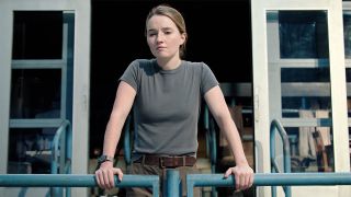 Abby standing on a balcony in The Last of Us season 2 episode 7