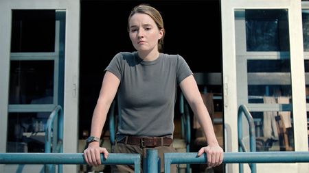 Abby standing on a balcony in The Last of Us season 2 episode 7