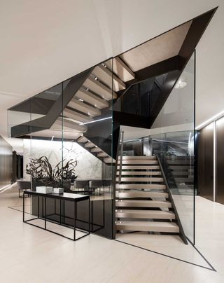 contemporary steel and glass staircase in Bel Air home