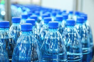 Some companies are packaging hand sanitizer in water bottles.