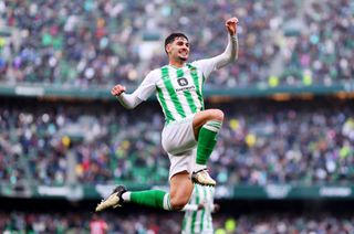 Johnny Cardoso of Real Betis celebrates scoring his team's third goal during the LaLiga EA Sports match between Real Betis and Athletic Bilbao at Estadio Benito Villamarin on February 25, 2024 in Seville, Spain