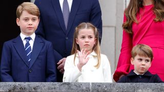 Prince George, Princess Charlotte and Prince Louis stand on the balcony of Buckingham Palace following the Platinum Pageant on June 5, 2022