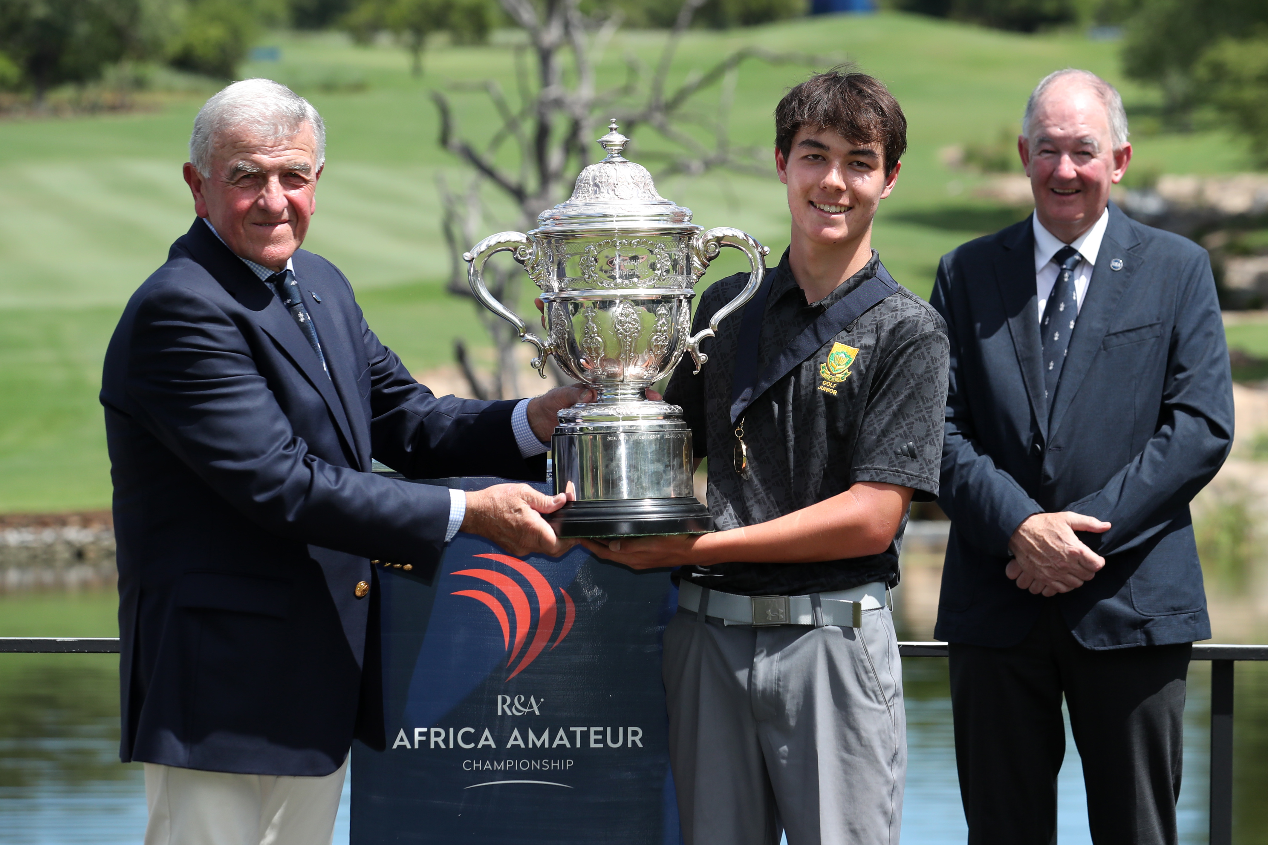 Bryan Newman posing with the African Amateur Championship trophy after his win in 2025