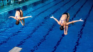 Two women synchronised diving