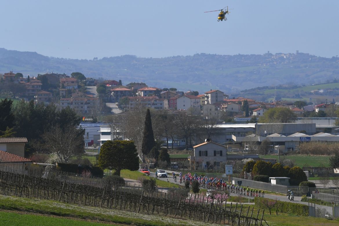 A television helicopter keeps watch over the peloton