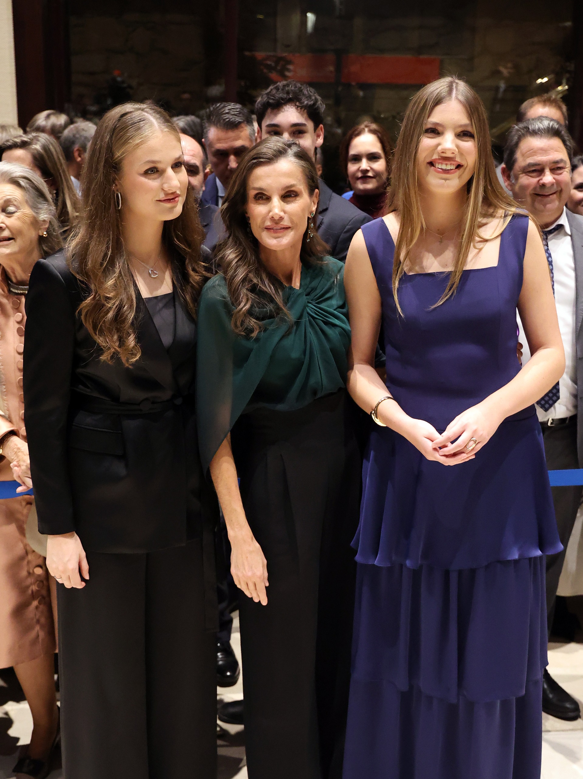 Princess Leonor, Queen Letizia and Infanta Sofia of Spain standing in a row