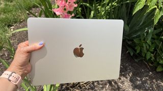 The top of a MacBook Air in a summer scene.