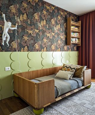 single bedroom with animal wallpaper and monkey light with wavy textured wall panel