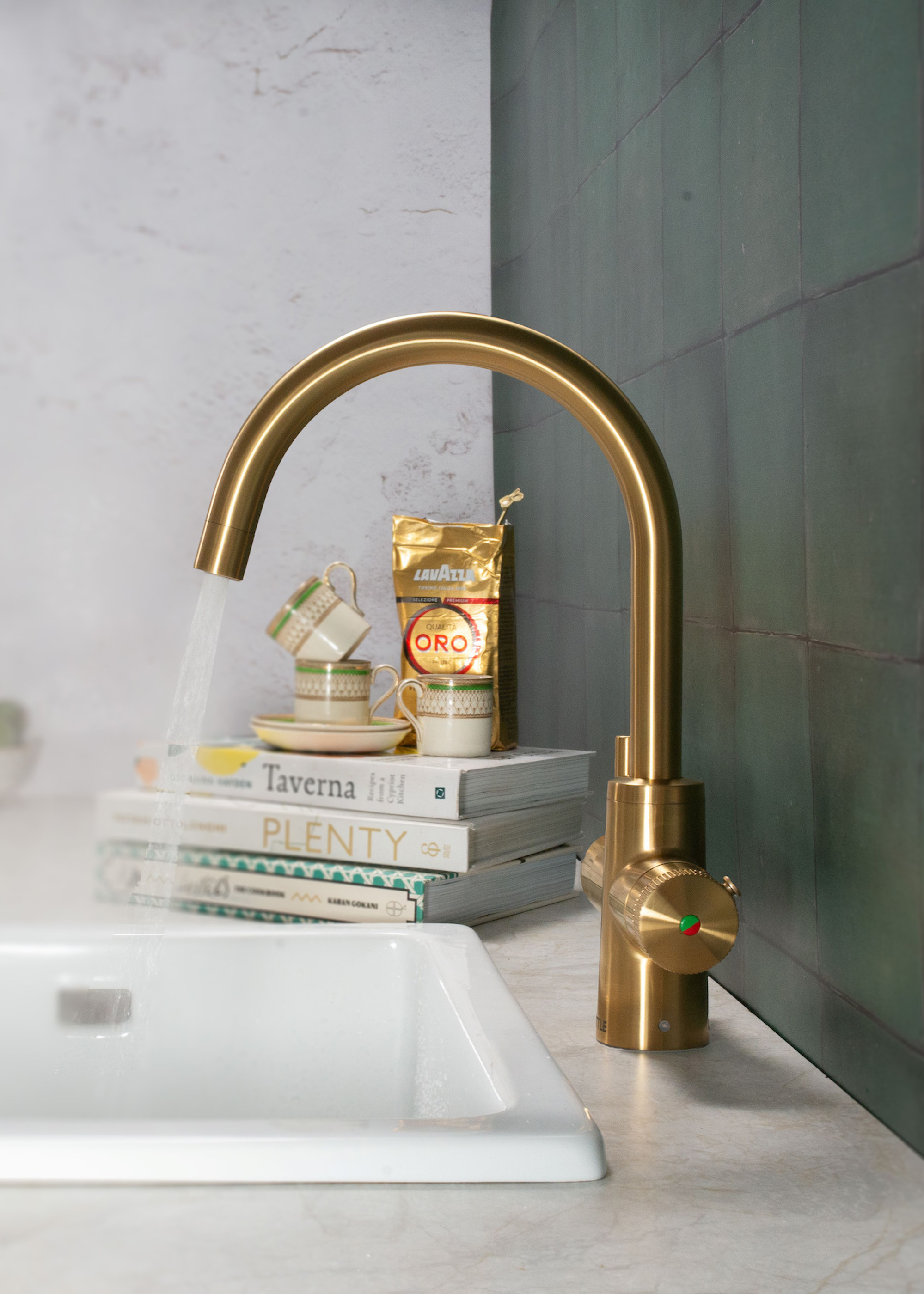 brass boiling water tap with water steaming out