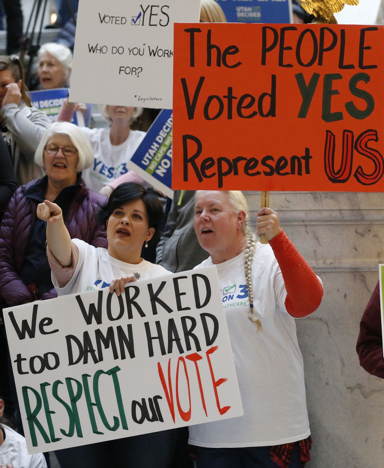 Protesters call on the Utah legislation to let Medicaid expansion go through.