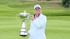 Lauren Coughlin holds up the Women's Scottish Open trophy in 2024