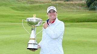 Lauren Coughlin holds up the Women's Scottish Open trophy in 2024