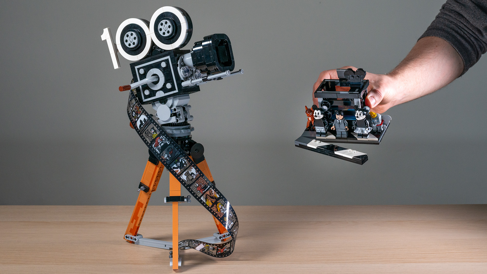 Lego Walt Disney Tribute Camera (43230) with hand holding the multi-plane camera side build