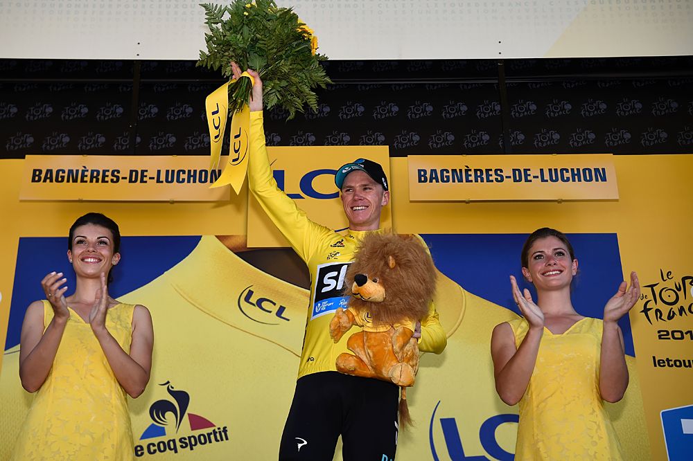 Chris Froome (Sky) celebrates his first maillot jaune of the 2016 Tour de France