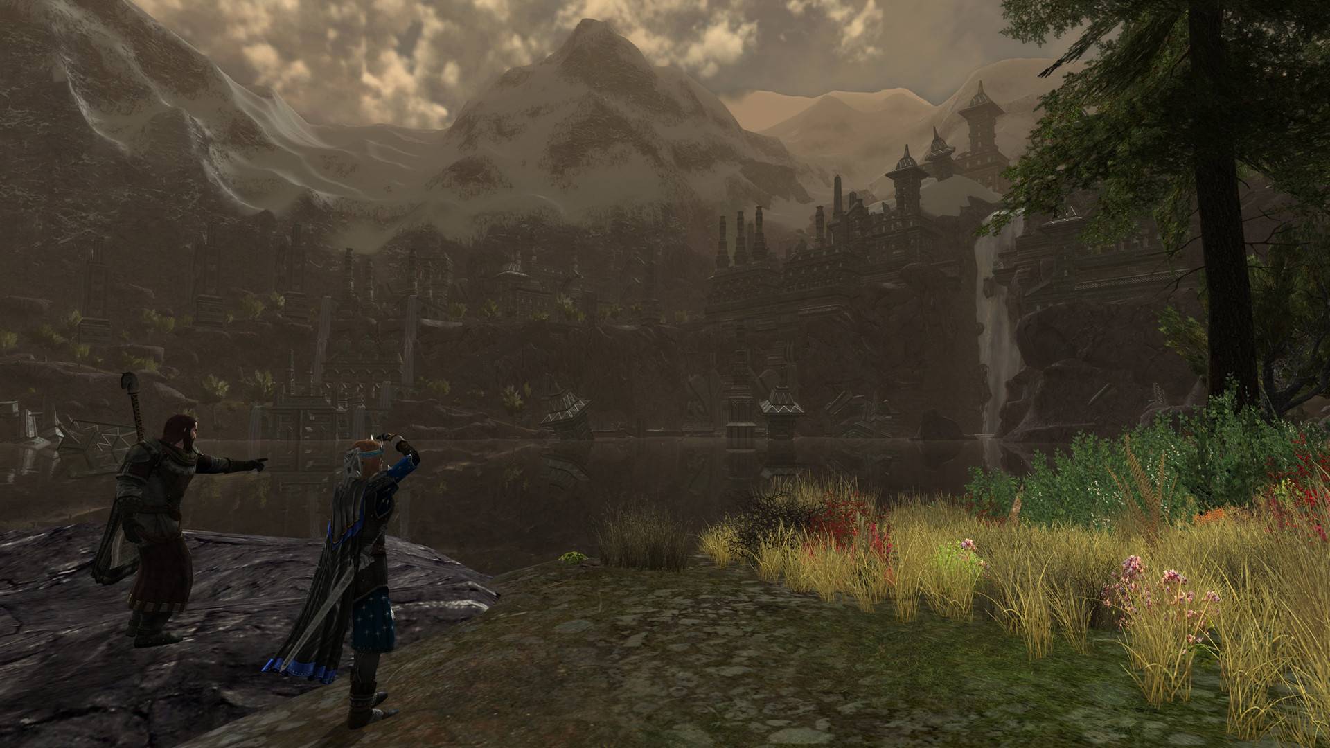 The Lord of the Rings Online screenshot shows two characters adventuring, looking at a building and a mountain in the distance.