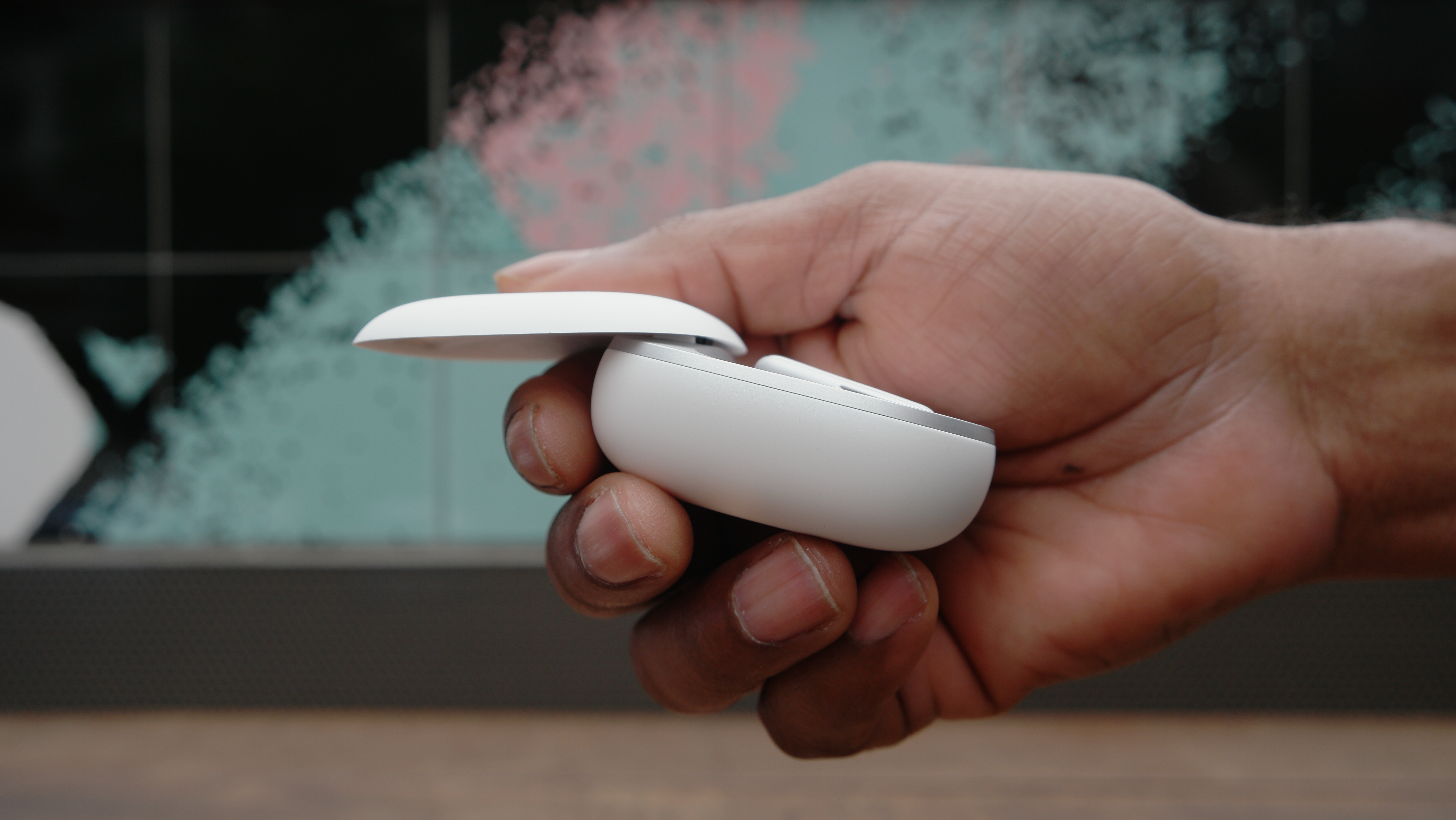 Anker Soundcore Liberty 5 shown with the case slide in the open position from the side
