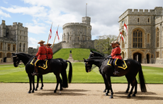Members of the Royal Canadian Mounted Police (RCMP) ahead of a ceremony where King Charles III formally accepts the role of Commissioner-in-Chief of the RCMP, in the quadrangle at Windsor Castle on April 28, 2023 in Windsor, England.