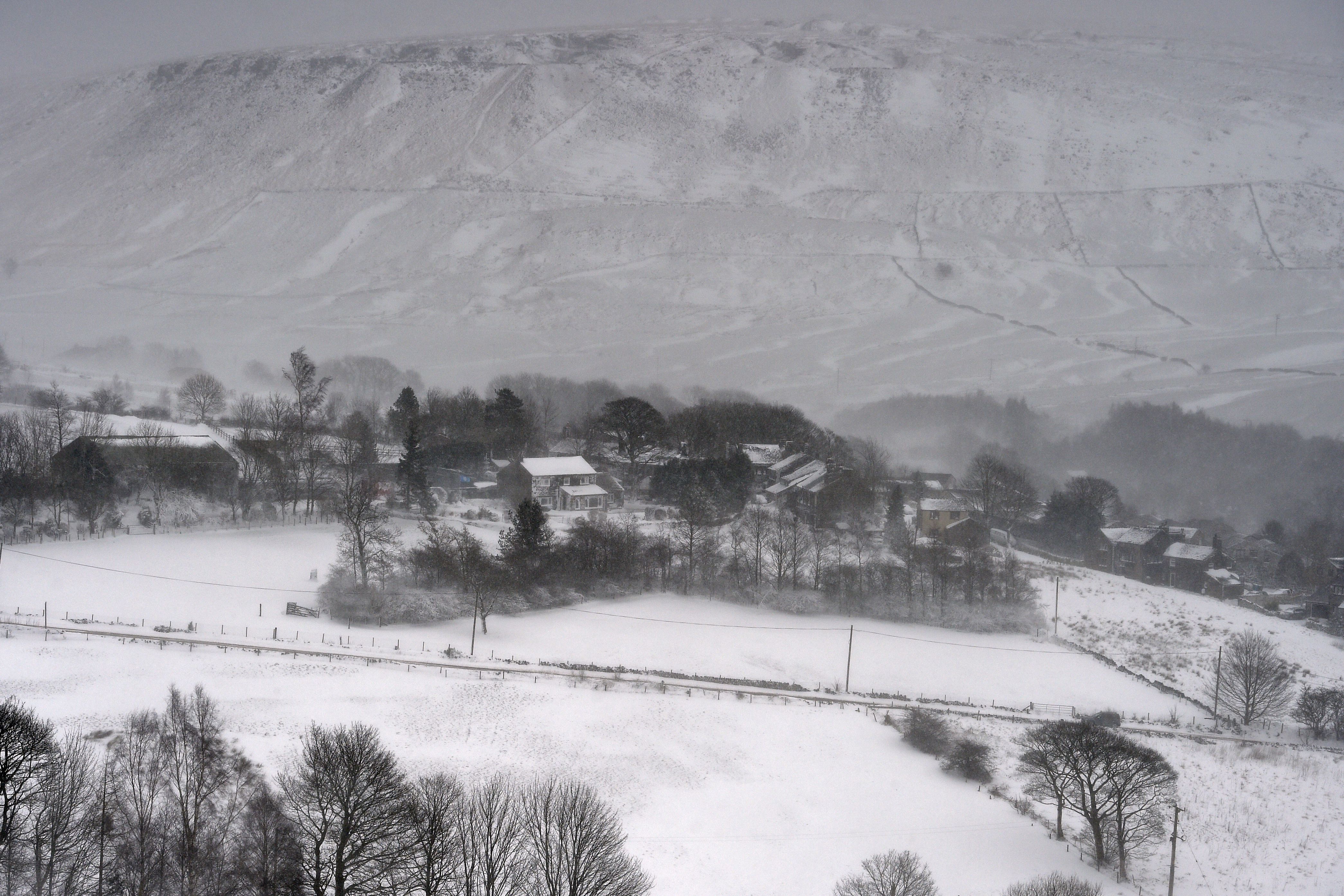 The countryside blanketed in snow near the village of Diggle, east of Manchester in northern England on March 18, 2018