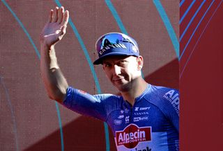 Team Alpecin's Kaden Groves celebrates on the podium after winning the stage 2 of La Vuelta a Espana 