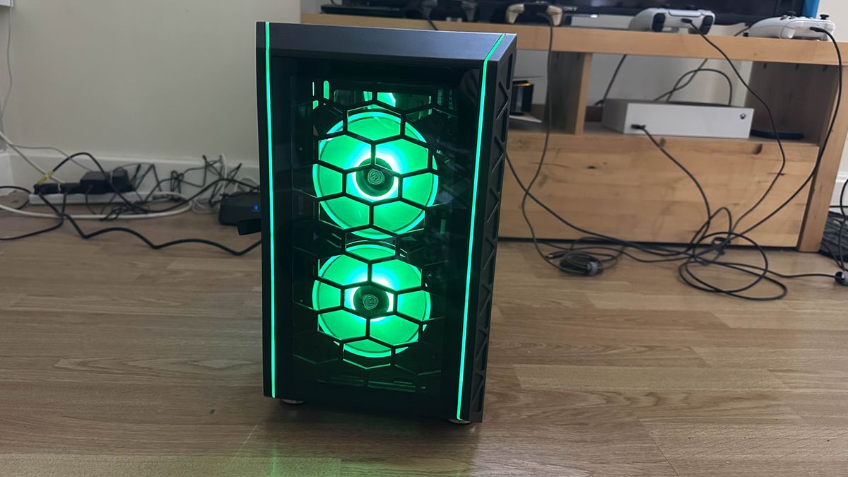 The Refract Jade PC with green lighting from the front